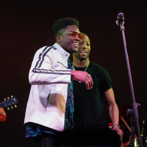 Cimafunk and Trombone Shorty perform onstage