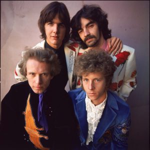 A portrait of the four members of the Flying Burrito Brothers
