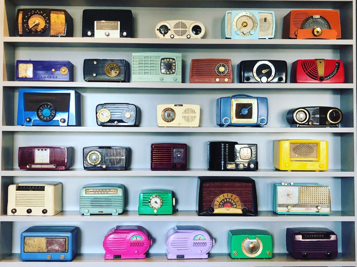shelves of colorful vintage radios
